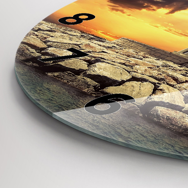Round glass wall clock Lighthouse on the water