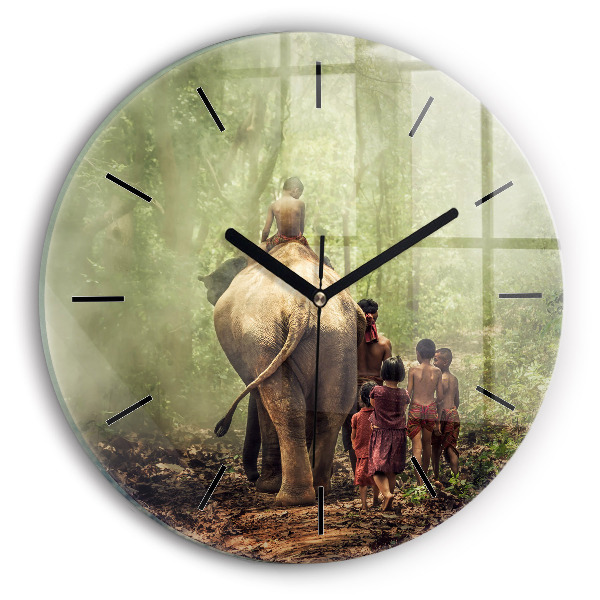 Round glass wall clock Children leading an elephant