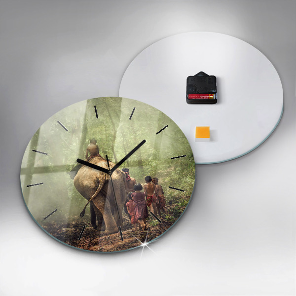 Round glass wall clock Children leading an elephant