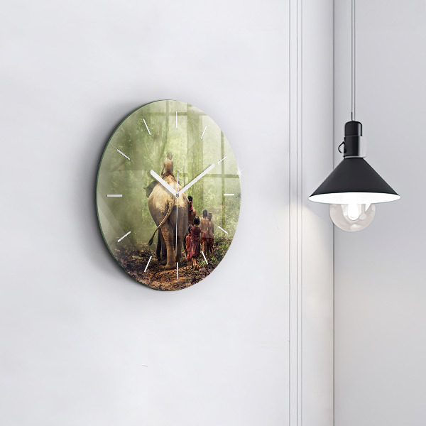 Round glass wall clock Children leading an elephant