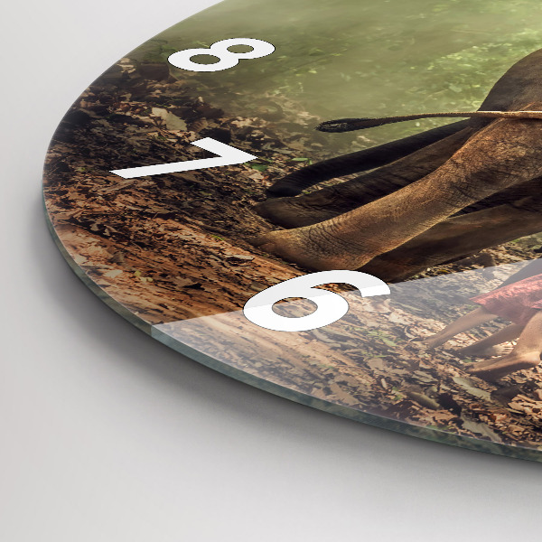 Round glass wall clock Children leading an elephant