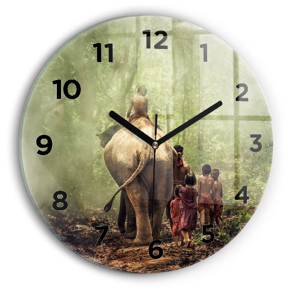 Round glass wall clock Children leading an elephant