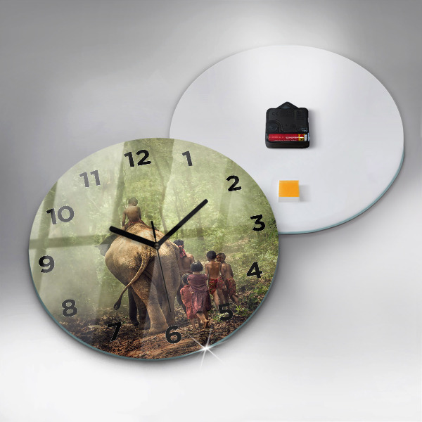Round glass wall clock Children leading an elephant