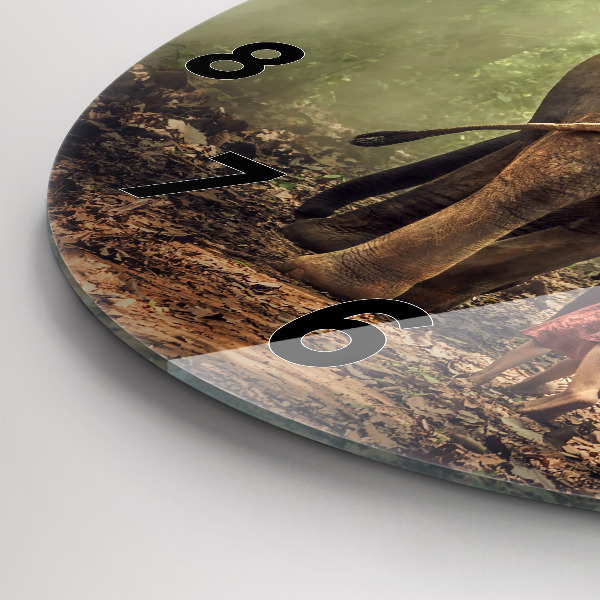 Round glass wall clock Children leading an elephant