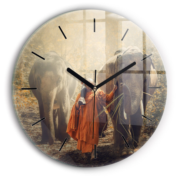 Round glass wall clock Monk leading elephants