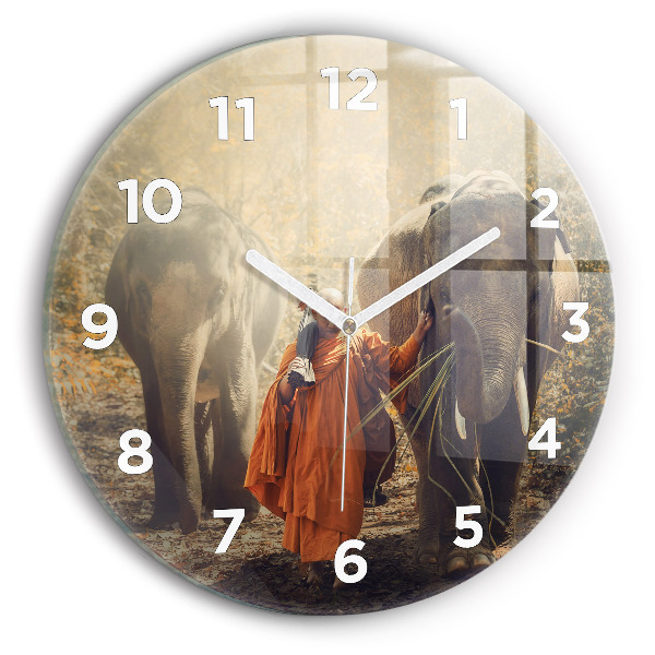 Round glass wall clock Monk leading elephants
