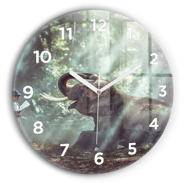 Round glass wall clock A boy is reading a book
