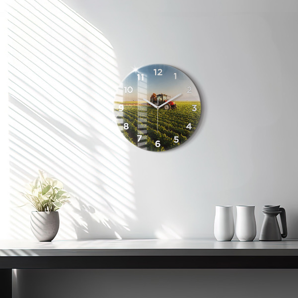 Round glass wall clock Tractor in a farm field