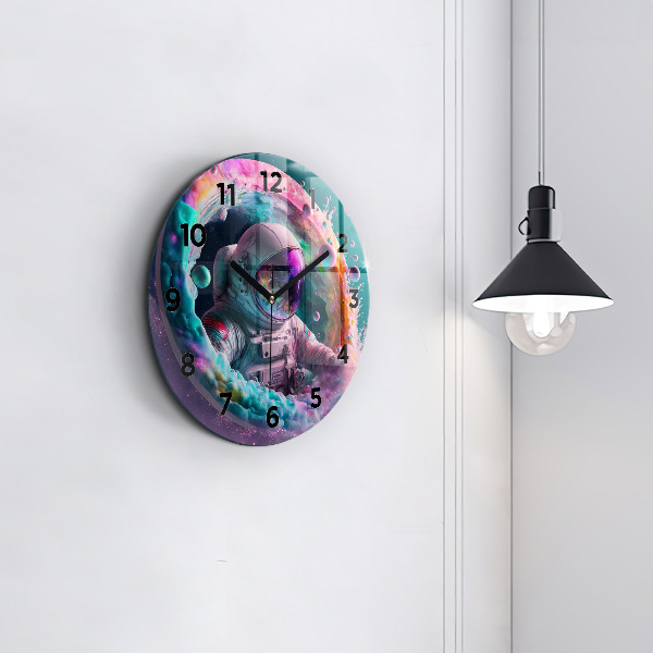 Round glass wall clock Cosmonaut and colorful clouds
