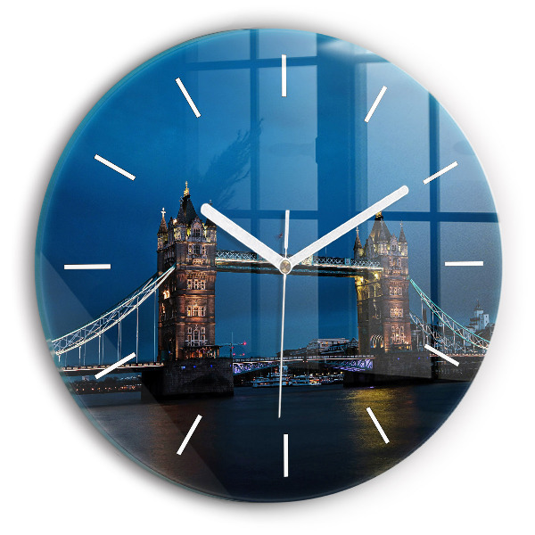Round glass wall clock Tower Bridge London at night