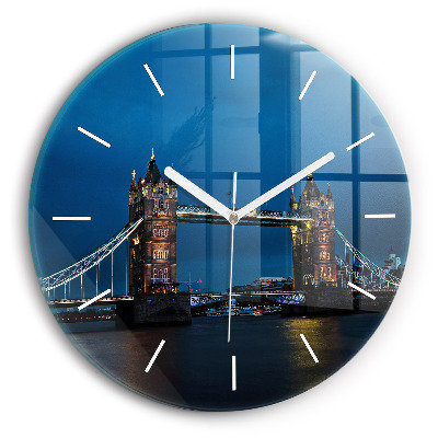 Round glass wall clock Tower Bridge London at night