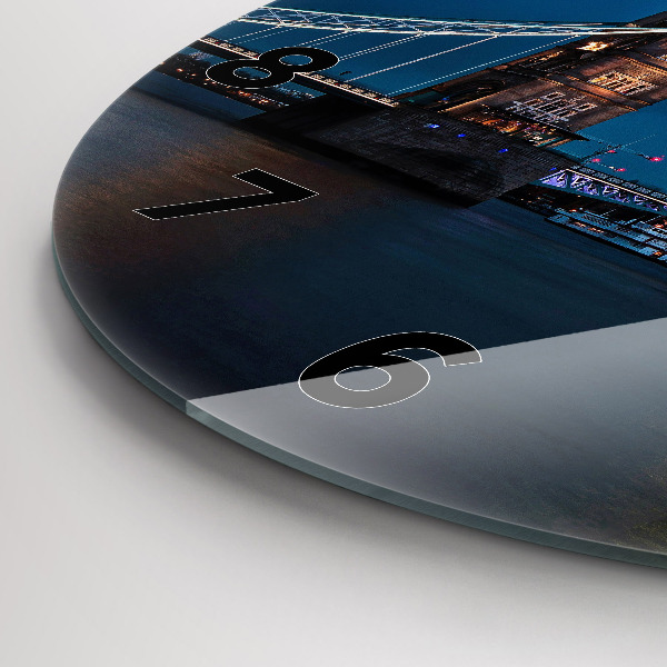 Round glass wall clock Tower Bridge London at night