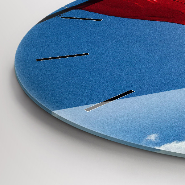 Round glass wall clock The Polish flag against the sky