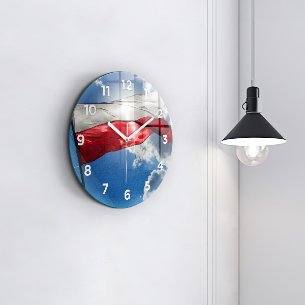 Round glass wall clock The Polish flag against the sky