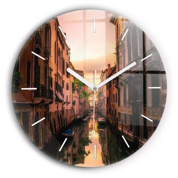 Round glass wall clock View of the canal in the city