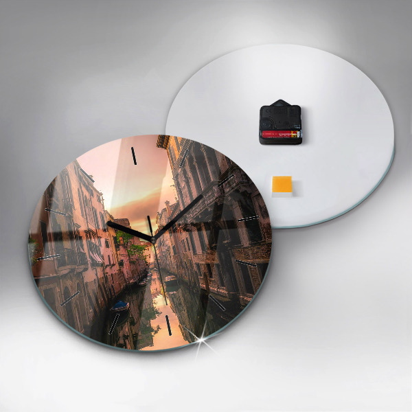 Round glass wall clock View of the canal in the city