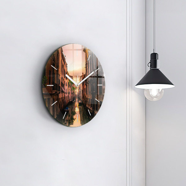 Round glass wall clock View of the canal in the city