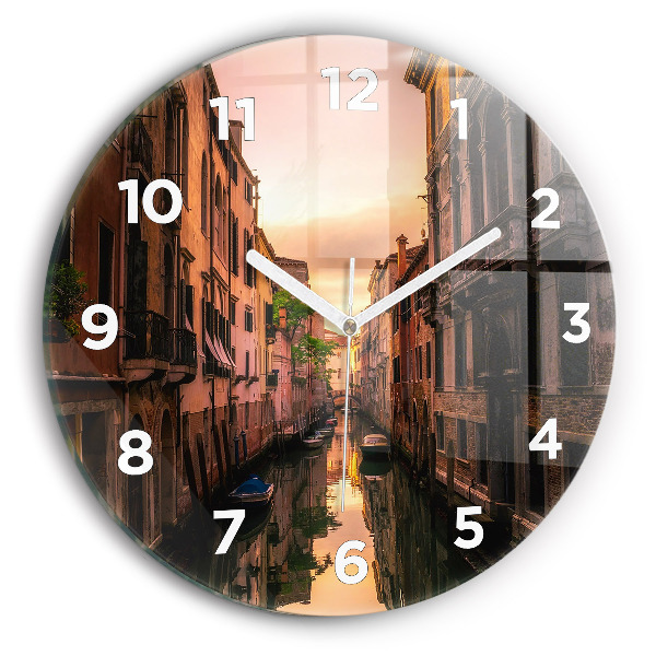 Round glass wall clock View of the canal in the city