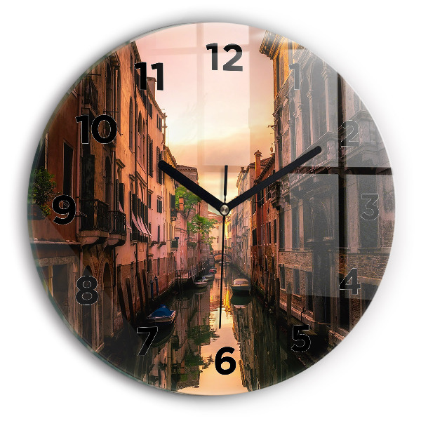 Round glass wall clock View of the canal in the city