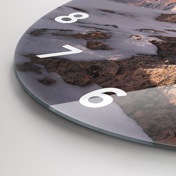 Round glass wall clock A mountain covered in snow