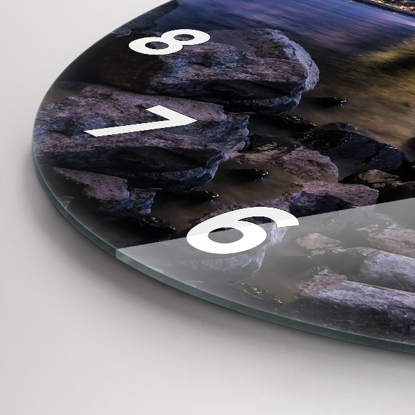 Round glass wall clock Rocky shore under the bridge