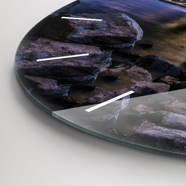 Round glass wall clock Rocky shore under the bridge