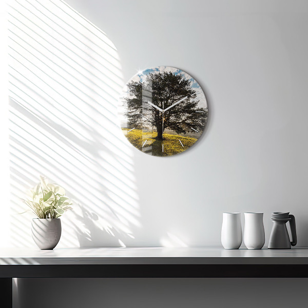 Round glass wall clock A tree on a hill