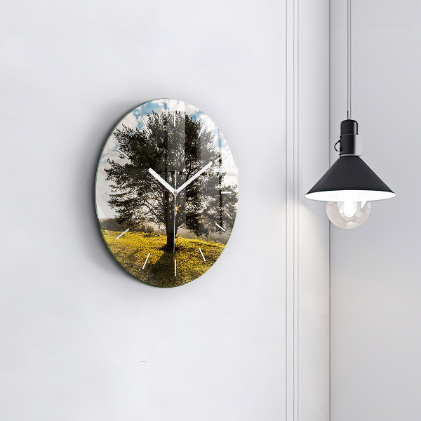 Round glass wall clock A tree on a hill
