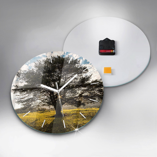 Round glass wall clock A tree on a hill