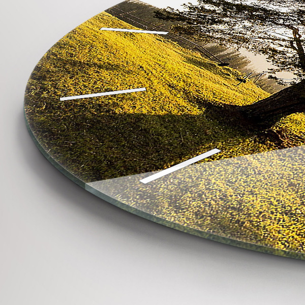 Round glass wall clock A tree on a hill
