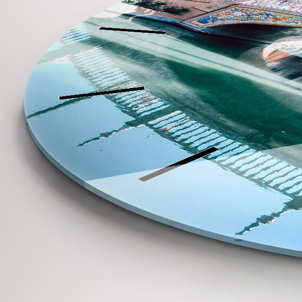 Round glass wall clock Plaza de Espana in Seville