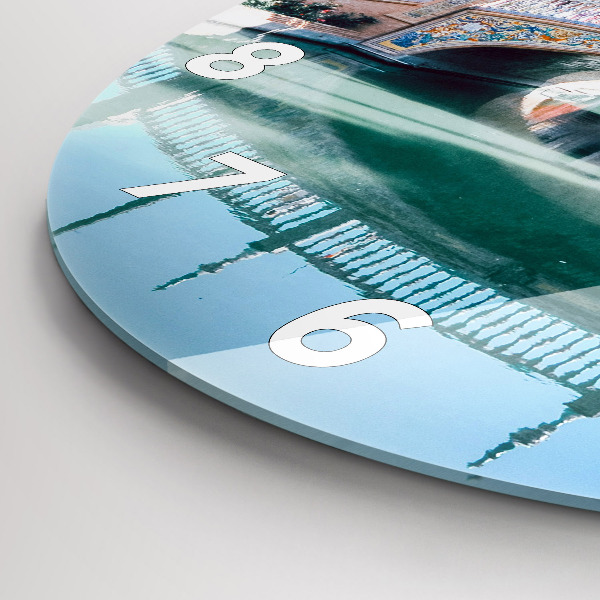 Round glass wall clock Plaza de Espana in Seville