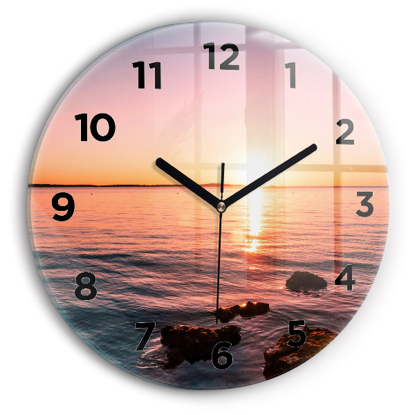 Round glass wall clock Rocks at sunset