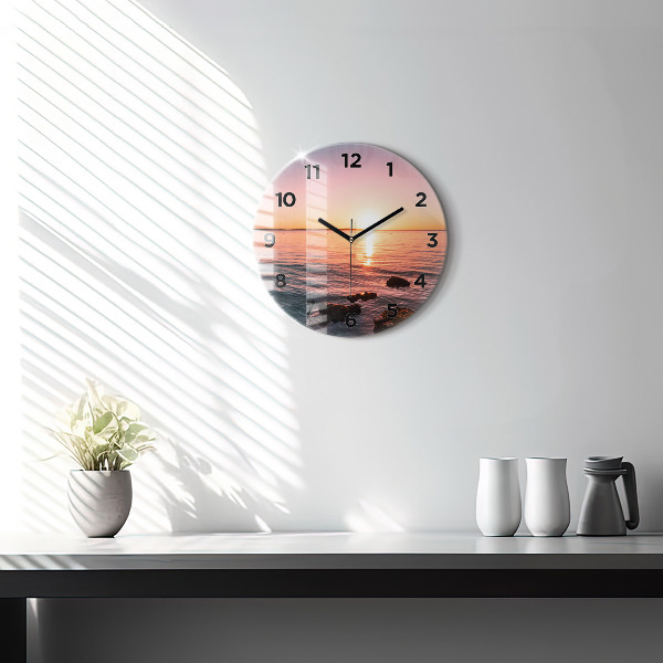 Round glass wall clock Rocks at sunset
