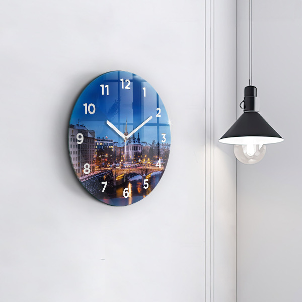 Round glass wall clock Panorama of the city of Pilsen