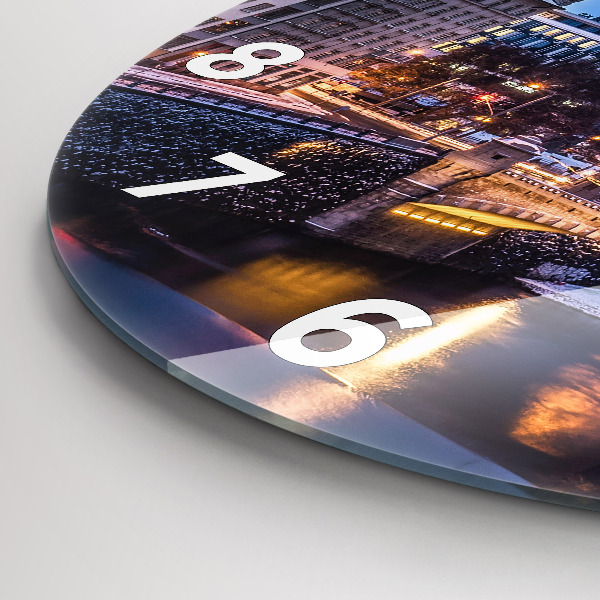 Round glass wall clock Panorama of the city of Pilsen