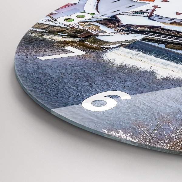 Round glass wall clock Panorama of the city in winter