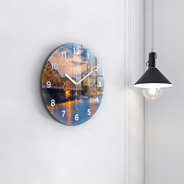 Round glass wall clock View of the town hall