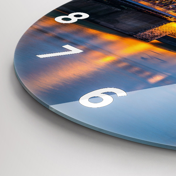 Round glass wall clock View of the town hall