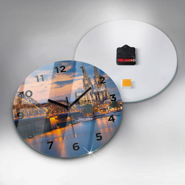 Round glass wall clock View of the town hall