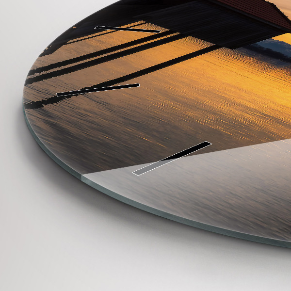Round glass wall clock Sunset over the lake