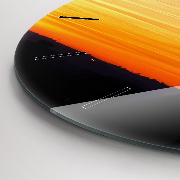 Round glass wall clock Building and sunset