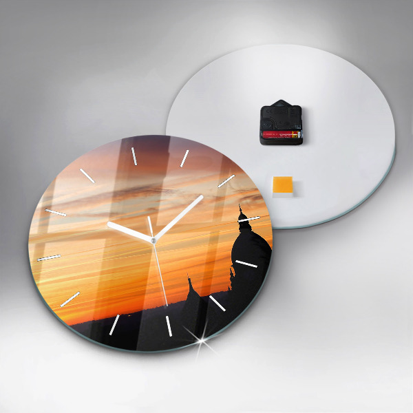 Round glass wall clock Building and sunset