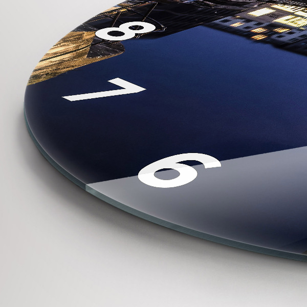 Round glass wall clock The city lit up at night