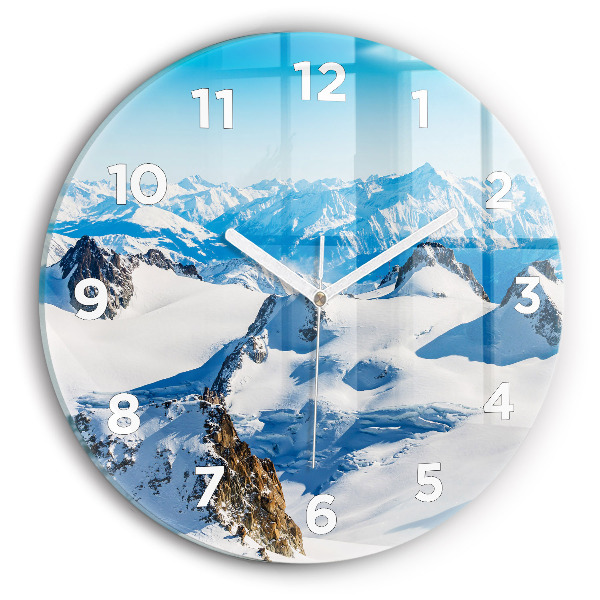 Round glass wall clock Skier in the Alps