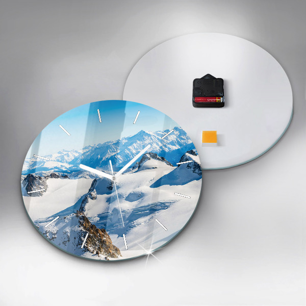 Round glass wall clock Skier in the Alps