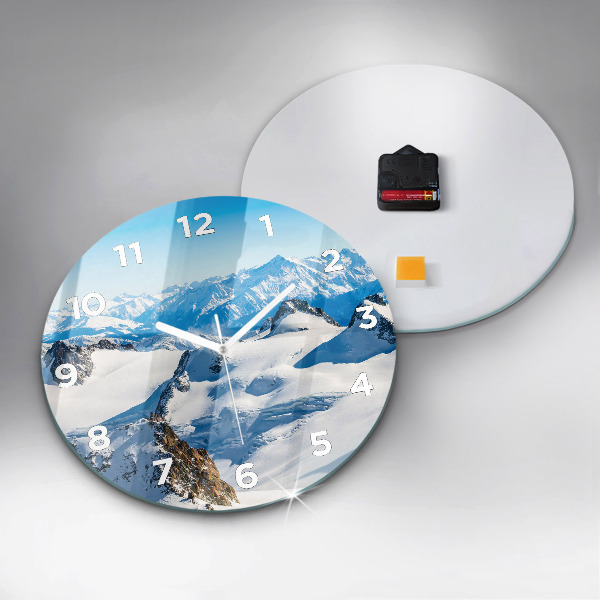 Round glass wall clock Skier in the Alps