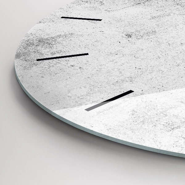 Round glass wall clock Concrete wall