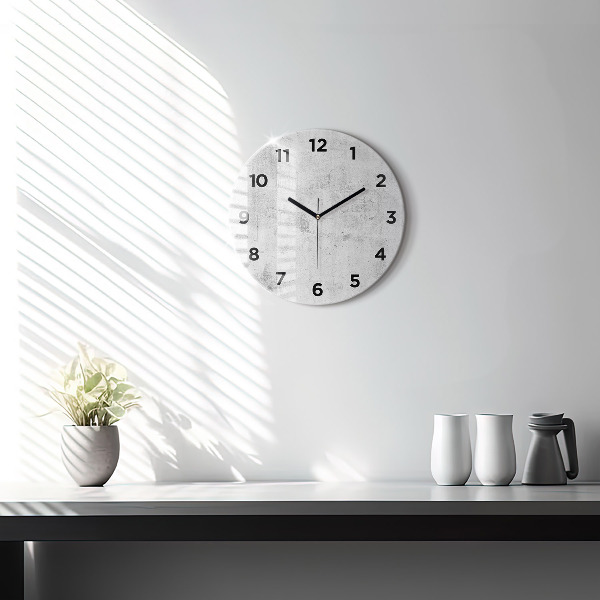 Round glass wall clock Concrete wall