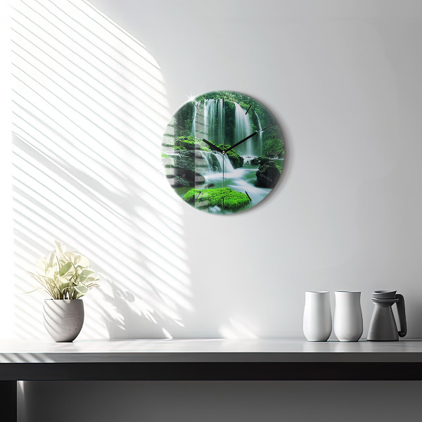 Round glass wall clock Waterfall among the moss